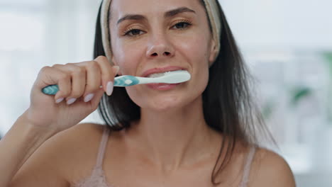 Pov-brushing-teeth-lady-morning-at-bathroom.-Happy-girl-cleaning-mouth-closeup