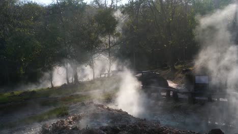 Huge-clouds-of-steam-rise-quietly-between-the-natural-Pai-Hot-springs-on-an-early-summer-morning-that-tourists-like-to-flock-to