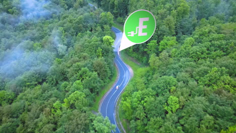 Electric-Car-Driving-Through-Green-Trees-To-Charging-Station