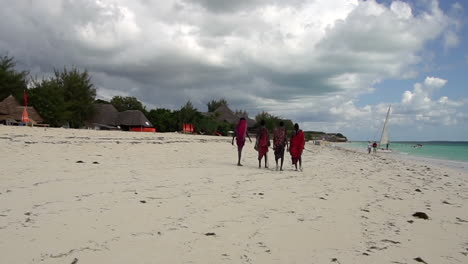 Maasai-Men-Walking-Away-on-the-Beach-in-Zanzibar-Tanzania