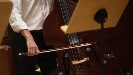 Symphony-Orchestra-Performance,-Close-Up-Of-Stringed-Cello-Instruments-At-Work
