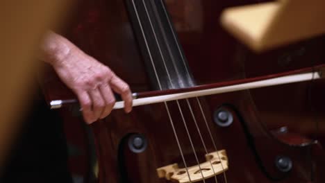 Symphony-Orchestra-Performance,-Close-Up-Of-Stringed-Cello-Instruments-At-Work