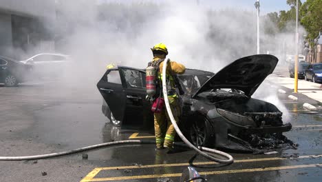 car-on-fire-in-parking-lot