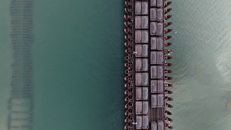 Drone-shot-looking-straight-down-on-mining-cars-full-of-iron-ore