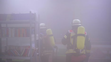 Firemen-in-room-full-of-smoke