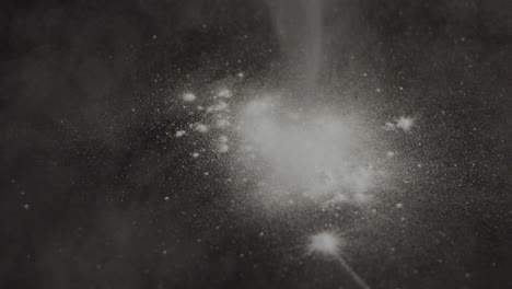White-powder-falling-on-table-in-slowmotion