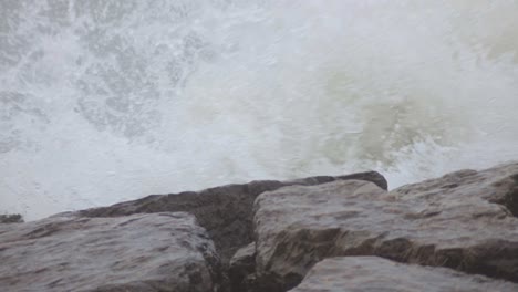 Waves-Crashing-On-The-Rocky-Shore-In-Canada---Closeup-Shot