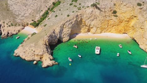 The-Golden-Bay,-beautiful-secluded-sandy-beach-on-the-coast-of-Island-Krk,-Croatia