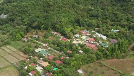 Angled-Aerial-View-of-a-Small-Modern-Village-in-the-Philippines-in-4K