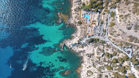 Stunning-birds-eye-view-of-coastline-of-Mallorca-with-the-beach-club-Mhares-in-summer-time---4k
