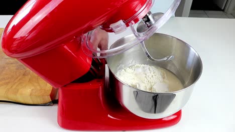 Putting-Dough-Mixer-Bowl-Into-The-Machine