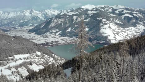 Beautiful-Snowy-Austrian-Alps-in-Wintertime-with-Lake-Zell-in-Background