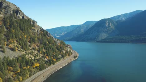 Bird´s-Eye-view-of-the-Columbia-River-Highway-in-Oregon---Washington-and-of-the-home-valley-park-in-autumn-with-colorful-yellow-and-orange-trees---4k