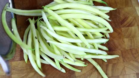 Empty-Washed-Butter-Beans-from-Strainer-on-to-Cutting-Board