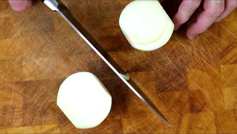 Cutting-Onion-in-Half-with-a-Knife
