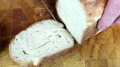 Slicing-a-Freshly-Baked-Sourdough-Bread