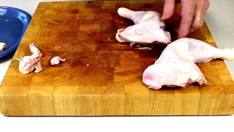 Trimming-Chicken-Legs-With-A-Knife
