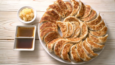 fried-gyoza-or-dumplings-snack-with-soy-sauce