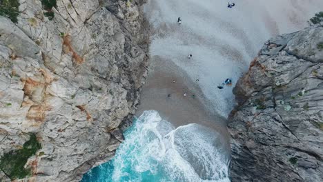 Top-down-view-of-the-famous-beach-Sa-Calobra-in-Mallorca---Tourist-hotspot---Spain-Majorca