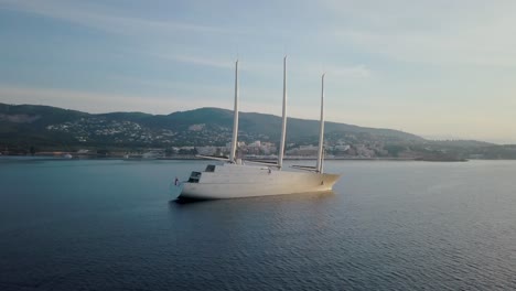 Amazing-4k-drone-footage-of-the-largest-sailing-yacht-in-the-world-while-sunrise-in-Mallorca,-Balearic-Islands,-Mediterranean-Sea---Lifestyle-of-the-rich