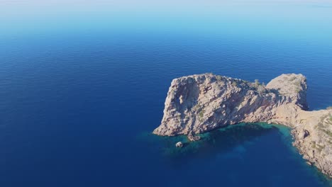 Amazing-drone-view-in-4k-of-the-rock-formation-Sa-Foradada-at-the-west-coast-of-Mallorca---Serra-de-Tramuntana