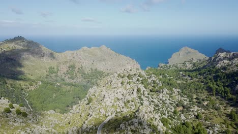 4k-drone-time-lapse-in-mountains-with-moving-shadows-of-clouds---Mallorca-Serra-de-Tramuntana-Sa-Calobra---Balearic-Islands,-Mediterranean-Sea---Epic-dramatic-landscape