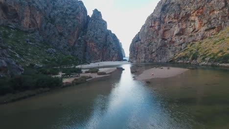 Stunning-4k-drone-footage-from-Sa-Calobra,-Mallorca-in-the-Serra-de-Tramuntana-mountains,-epic-landscape---Massive-cliffs---Holiday-in-balearic-islands