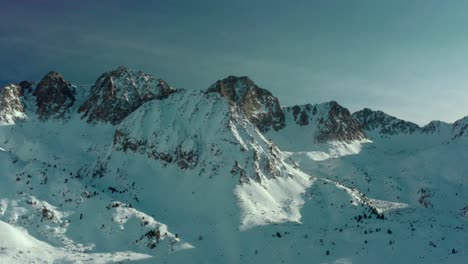 Beautiful-snowy-mountain-range-peaks-in-Andorra-Pyrenees-Mountains,-aerial