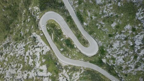 Drone-footage-in-4k-of-cars-in-serpentine-road---Mallorca-Serra-de-Tramuntana-Sa-Calobra---Dangerous-road