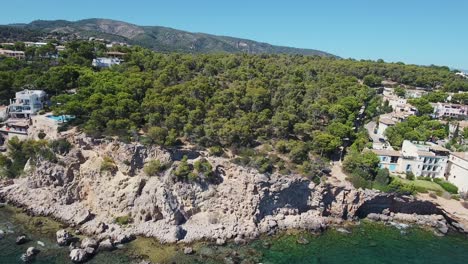 Stunning-view-of-the-coastline-in-the-south-of-Mallorca-in-summer---Illetas---Balearic-Islands---Mediterranean-Sea