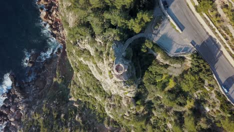 4k-top-down-footage-of-a-tower-at-the-ocean---Tourist-viewing-point---Tourist-in-Mallorca---Serra-de-Tramuntana-Torre-del-Verger