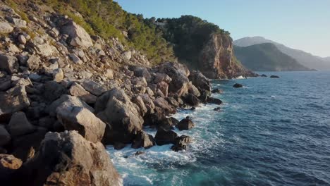 4k-drone-footage-of-a-epic-landscape-scenery-in-Europe---Westcoast-of-Mallorca---Serra-de-Tramuntana-Majorca---Jurassic-Park---Balearic-Islands-Spain-Mediterranean-Sea