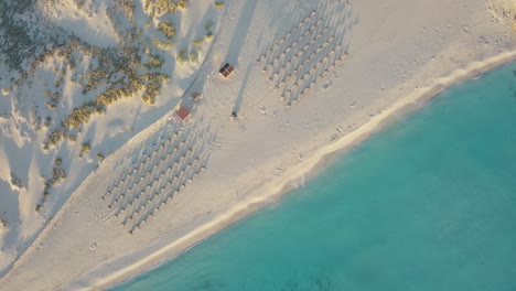 Top-down-aerial-footage-in-4k-of-empty-beach---Mallorca-Cala-Mesquida-in-the-morning-while-sunrise---Covid19-virus-crises,-pendemic