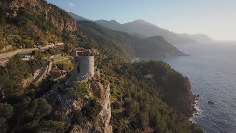Aerial-footage-of-tourists-enjoying-the-view-of-a-viewing-point-with-a-stunning-landscape-scenery---Sunset-at-Westcoast-in-Mallorca