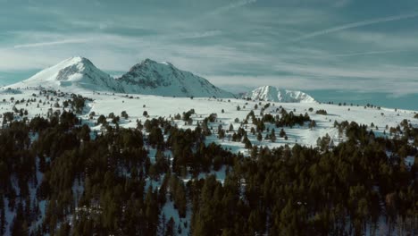 Pas-De-La-Casa-ski-resort-mountain-in-the-Andorra-Pyrenees,-aerial-winter-landscape