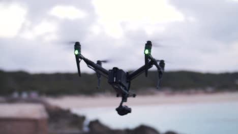 Slow-Motion-footage-of-flying-quadcopter---DJI-Inspire-2---Professional-film-production-equipment---Flyying-away