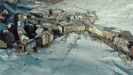 Ski-resort-hotels-and-accommodation-in-winter-ski-season,-aerial-view