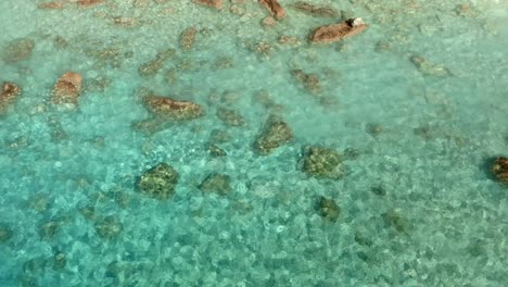 Crystal-Clear-Turquoise-Water-on-Island-Beach-Coast-in-Greece,-Aerial