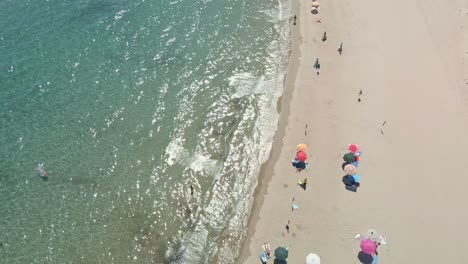 Overhead-Slow-Motion-People-at-Beach-in-Summer