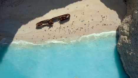 Greece-Tourists-at-Smugglers-Cove-on-Navagio-Shipwreck-Beach