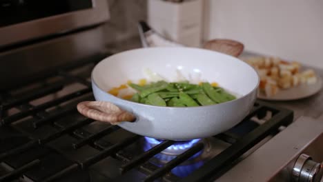 Close-Up-Of-Pan-Of-Cooking-Vegetables-In-Slow-Motion