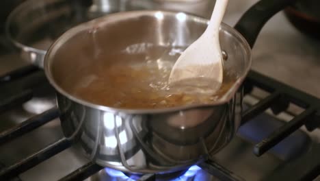 Stirring-Pasta-In-Pot-Of-Boiling-Water-In-Slow-Motion
