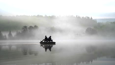 Fishermen-Fishing-On-Misty-Lake-In-The-Morning
