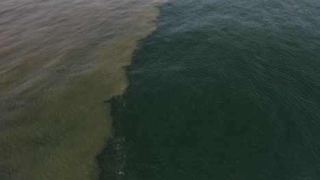 Amazing-natural-phenomenon,-freshwater-and-seawater-mixing-in-ocean,-aerial