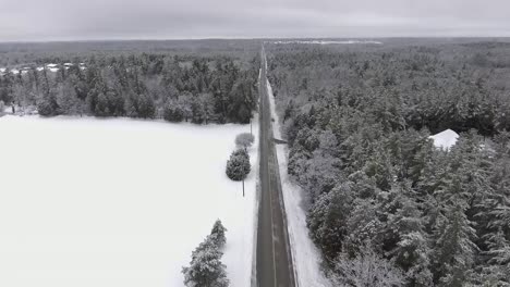 Drone-Flying-Over-Rural-Road-In-4K
