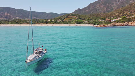 Aerial-People-Enjoying-on-Boat-at-Sardinia-Tropical-Sea
