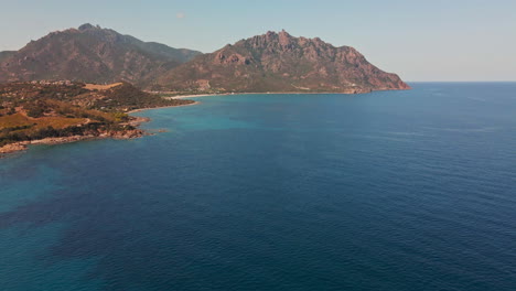 Beautiful-Sardinia-Landscape-With-Mountains-And-Crystal-Clear-Water-During-Summer-In-Sardinia,-Italy---Aerial-drone-wide-shot