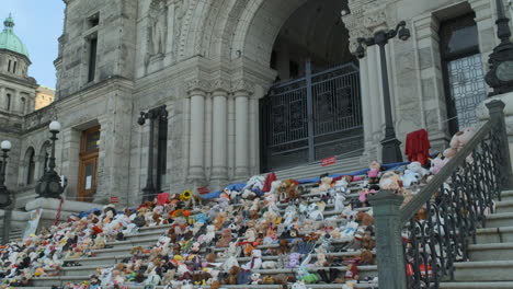 Shot-of-the-BC-Legislative-Assembly-buildings-with-a-memorial-for-Indigenous-Children-victims-on-the-front-steps-in-Victoria-BC