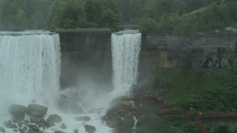 Pan-across-the-Bridal-Falls-and-the-American-Falls-with-seagulls-through-the-frame