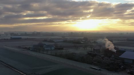 farmland-Sunrise-Drone-shot-with-winter-morning-dew,-Netherlands-farmland